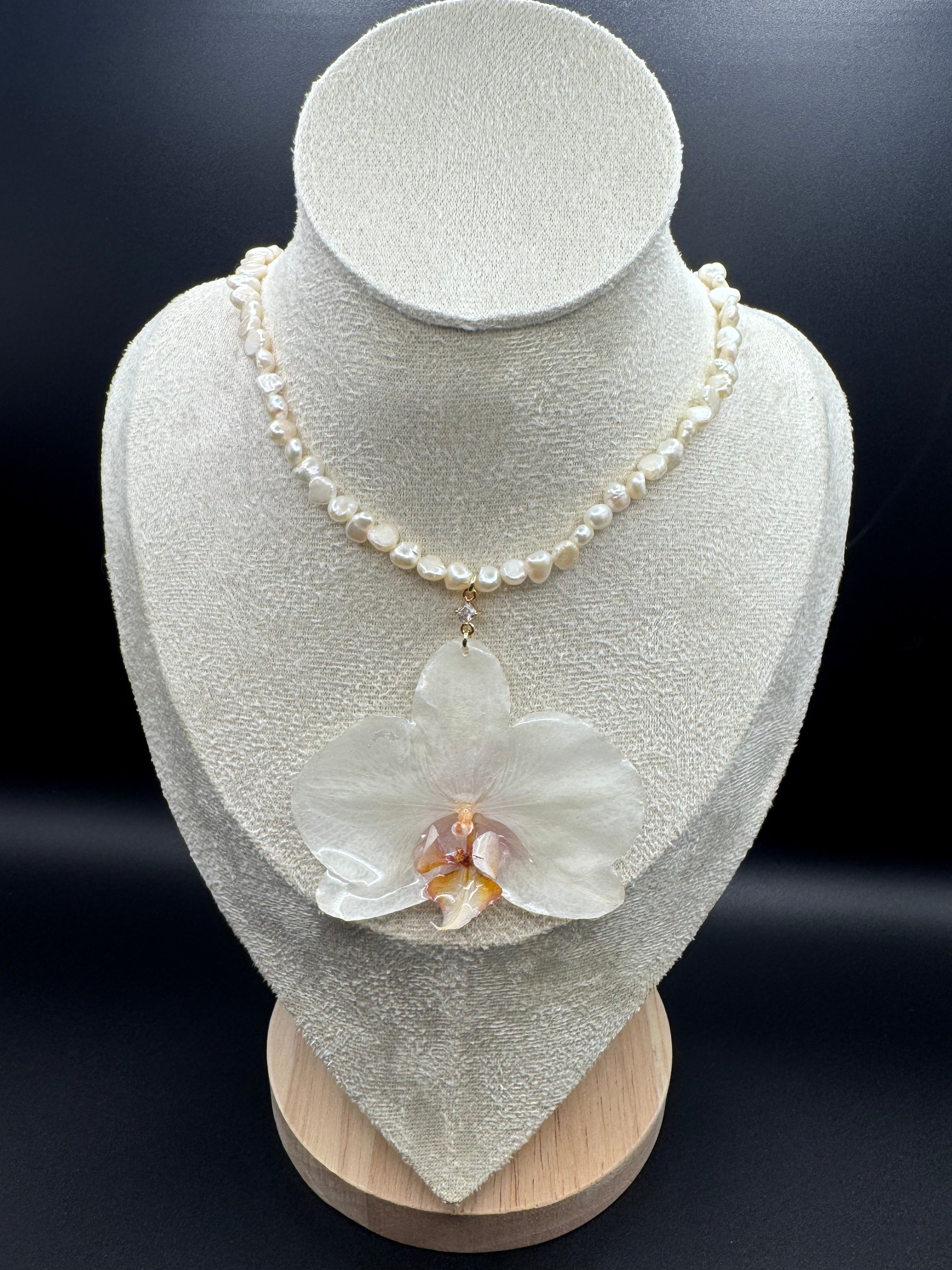 White Orchid on String of Natural Freshwater Pearls